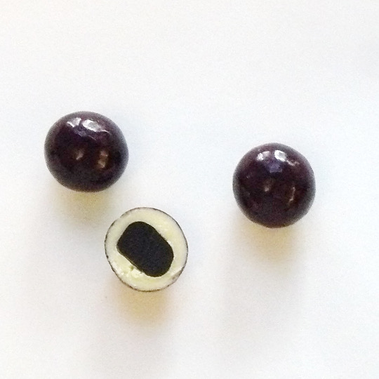 Choco liquorice marbles with blueberry coating, swedish