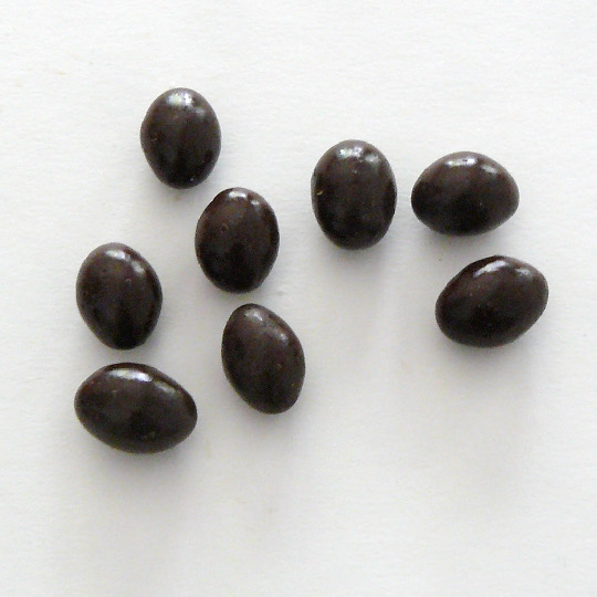 Tangy salmiac liquorice covered in dark chocolate, german