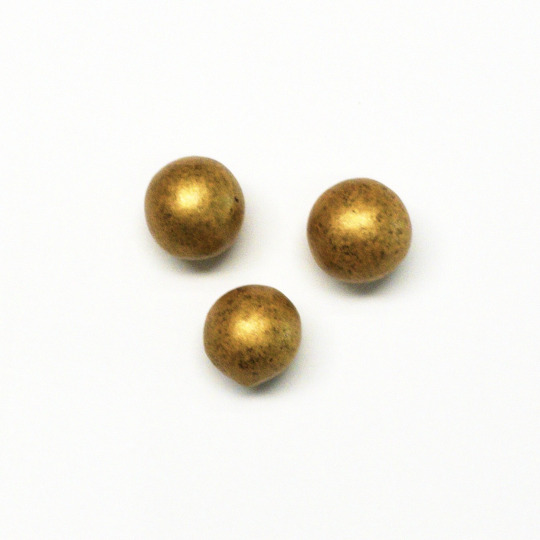 Delicious liquorice marbles covered in chocolate, swedish