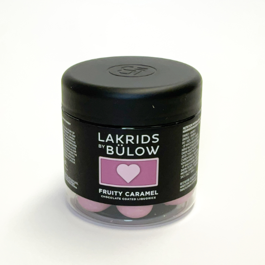 Liquorice marbles covered with milk chocolate and black currant by johan  buelow, danish
