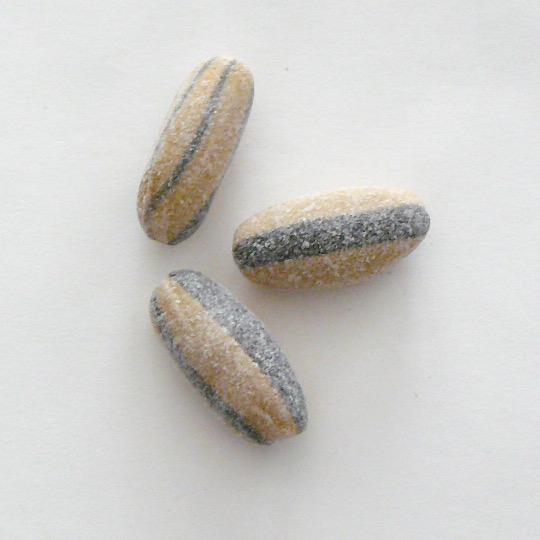 Liquorice bonbon filled with salmiac and caramel powder, swedish