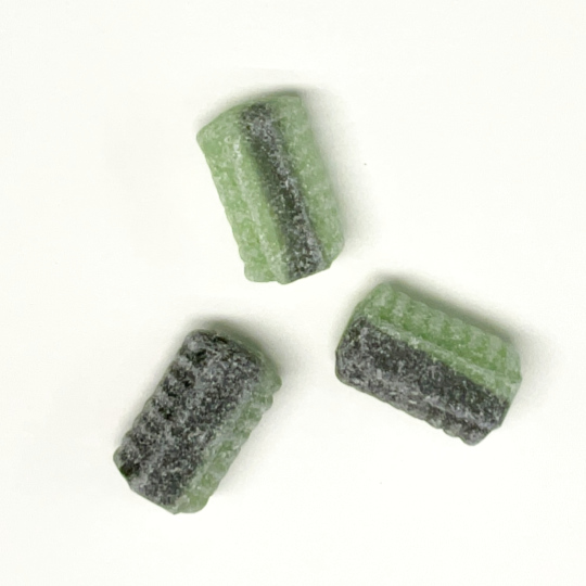 Liquorice bonbon filled with salmiac and apple sherbet, swedish