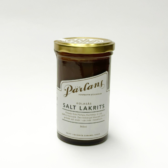 Glas of salted liquorice caramel sauce ideal for desserts and over ice cream, swedish