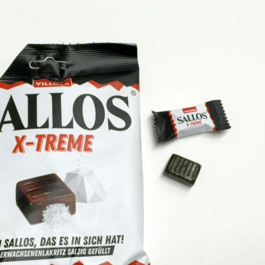 Bag of spicy liquorice candy with salty filling, german
