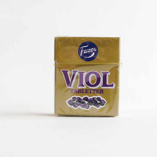 Liquorice pastilles with violet in the box, finnish