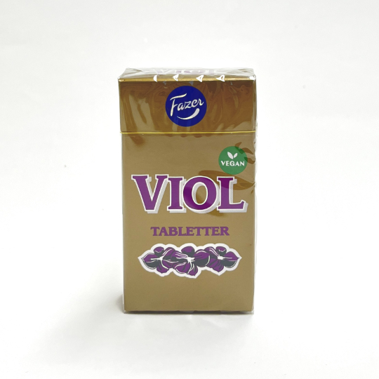 Liquorice pastilles with violet in the box, finnish