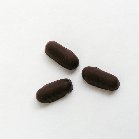 Soft strong salmiak liquorice with pepper covered in dark chocolate, german