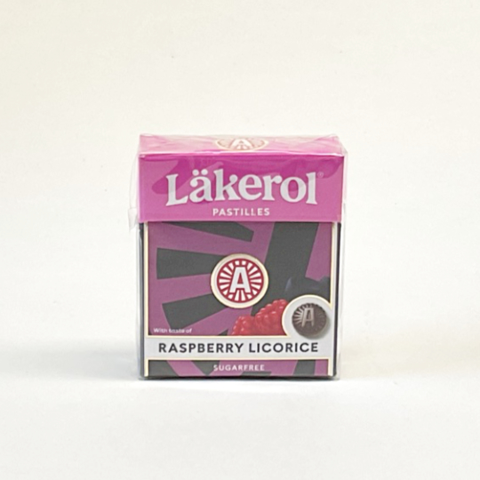 Firm liquorice pastilles with raspberry and sweetener in a box, swedish