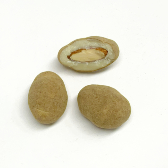 Almonds covered with white chocolate and salmiac, danish