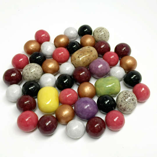 Mix of marbles with chocolate and liquorice kernel, swedish