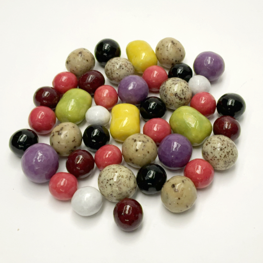 Mix of marbles with chocolate and liquorice kernel, swedish