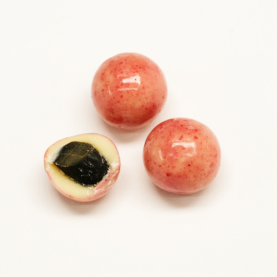 Choco liquorice marbles with raspberry coating, swedish