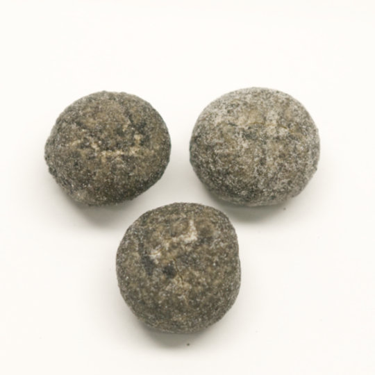 Liquorice bonbons with a semi strong salmiak filling, swedish