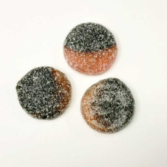 Sour liquorice coins with strawberry, swedish